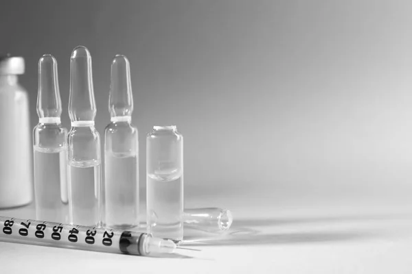 Pharmaceutical Ampoules Syringe Light Grey Background Space Text — Stockfoto