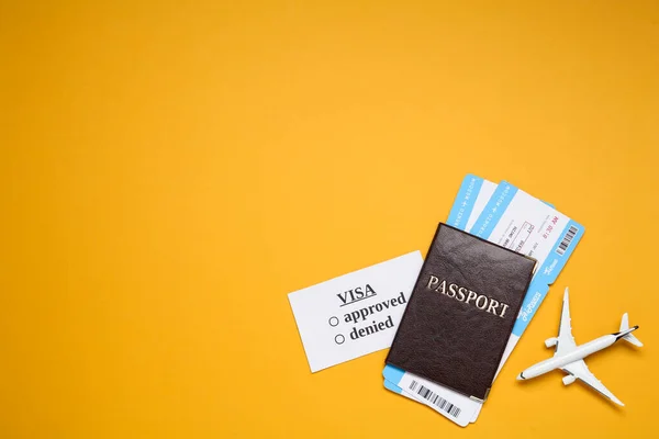 Flat Lay Composition Passport Toy Plane Tickets Orange Background Space — Foto de Stock