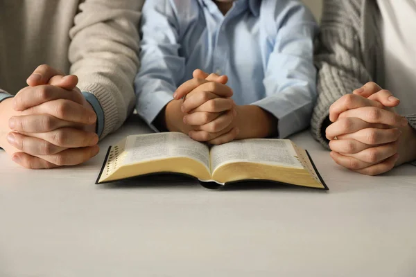 Boy His Godparents Praying Together White Wooden Table Closeup — Stock Photo, Image