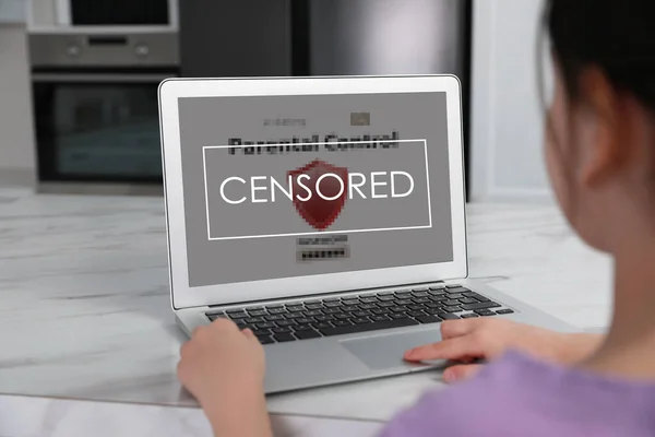 Display Censorship Sign Little Girl Using Laptop Marble Table Closeup —  Fotos de Stock