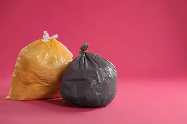 Trash Bags Full Garbage Pink Background Space Text — Stok fotoğraf