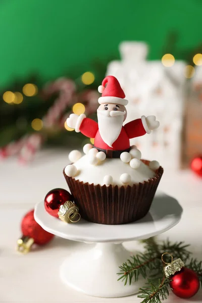 Tasty Christmas Cupcake Santa Claus Figure White Table — стокове фото