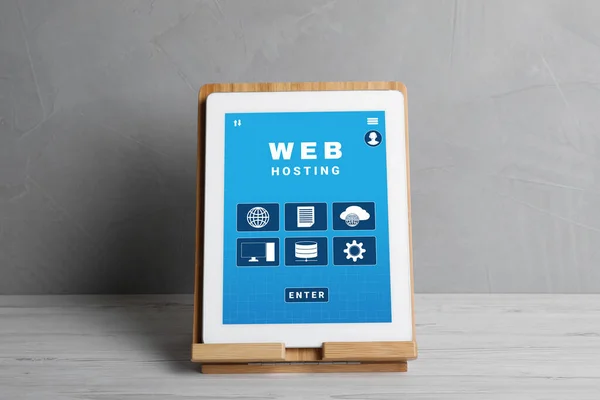 Web Hosting Service Modern Tablet White Wooden Table — 图库照片
