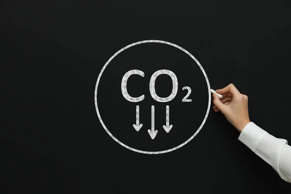 Reduce Carbon Emissions Woman Drawing Circle Chemical Formula Co2 Blackboard — Foto Stock