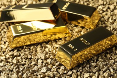 Many gold ingots on nuggets, closeup view