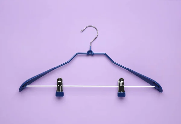 Empty Hanger Lilac Background Top View — Stockfoto