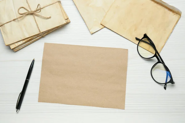 Old Letters Blank Card Pen Glasses White Wooden Table Flat — Stock fotografie