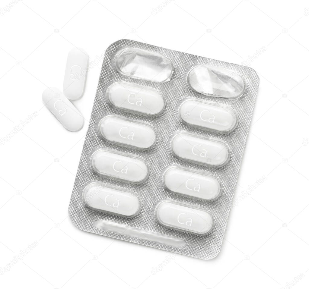 Blister pack with calcium supplement pills on white background, flat lay