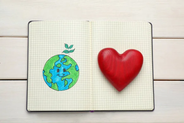 Happy Earth Day Notebook Drawing Planet Decorative Heart White Wooden — Fotografia de Stock