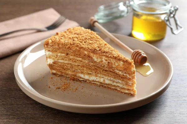 Slice Delicious Layered Honey Cake Served Wooden Table — стоковое фото