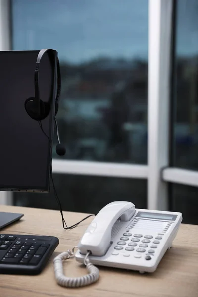 Stationary Phone Modern Computer Headset Wooden Desk Indoors Hotline Service — Stockfoto