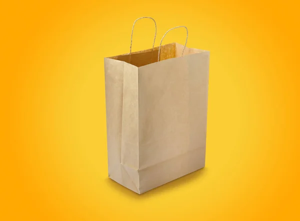 Kraft Paper Bag Yellow Background Mockup Design — стоковое фото