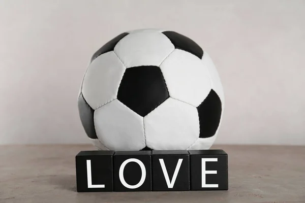 Soccer Ball Cubes Word Love Grey Table Light Background — Foto de Stock