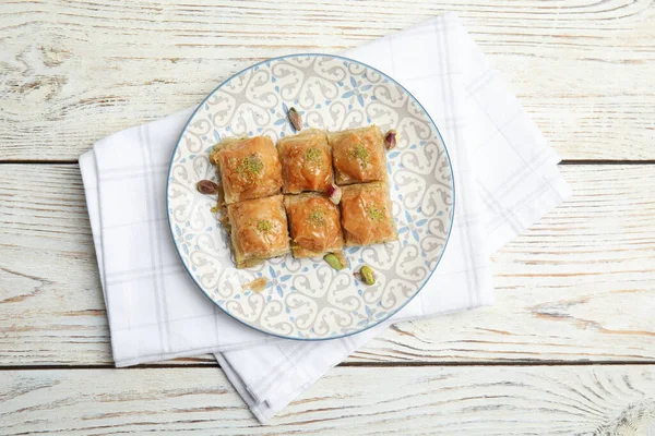 Delicious Baklava Pistachio Nuts Napkin White Wooden Table Top View — 스톡 사진