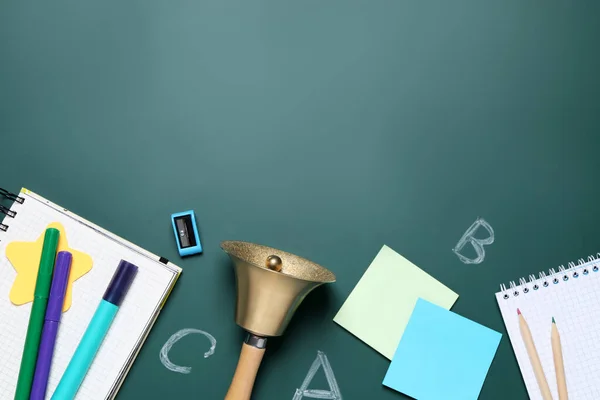 Flat Lay Composition Golden Bell School Stationery Green Chalkboard Space — Fotografia de Stock