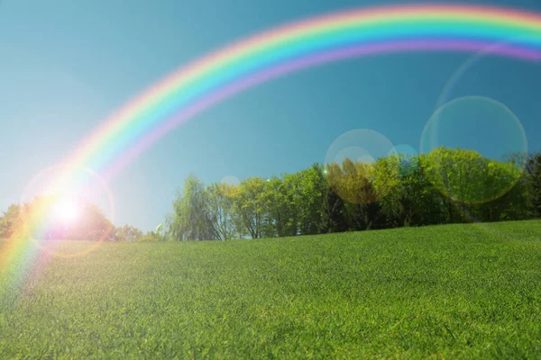 Picturesque View Green Meadow Beautiful Rainbow Blue Sky Sunny Day — Stock Photo, Image