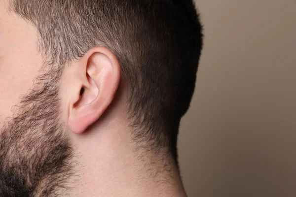 Man Grey Background Closeup Ear — Stockfoto