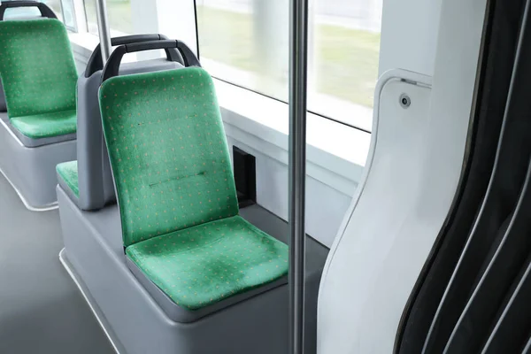 Interior Del Transporte Público Con Cómodos Asientos Verdes —  Fotos de Stock