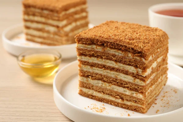 Delicious Layered Honey Cake Served Wooden Table Closeup — Foto de Stock