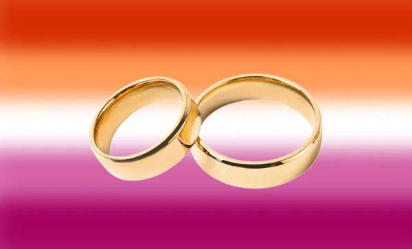 Gouden Trouwringen Achtergrond Kleur Van Lesbische Vlag — Stockfoto