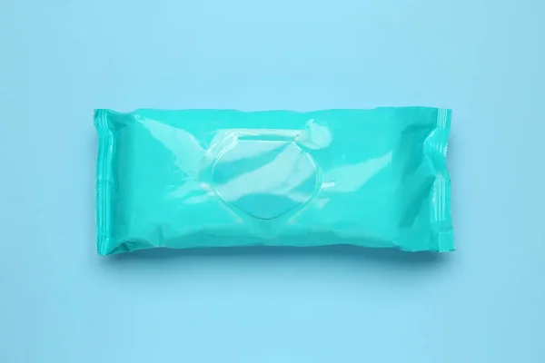 Wet Wipes Flow Pack Light Blue Background Top View — Stock Photo, Image