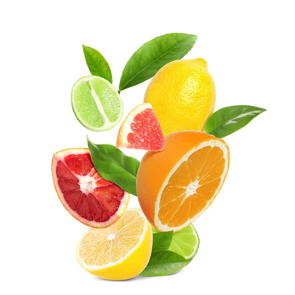 Fresh Juicy Citrus Fruits Green Leaves White Background — Stockfoto