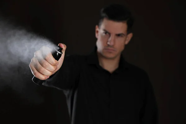 Man Using Pepper Spray Black Background Focus Hand — Stock Photo, Image