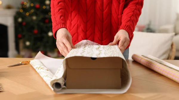 Woman Wrapping Christmas Gift Wooden Table Indoors Closeup — Stock Photo, Image