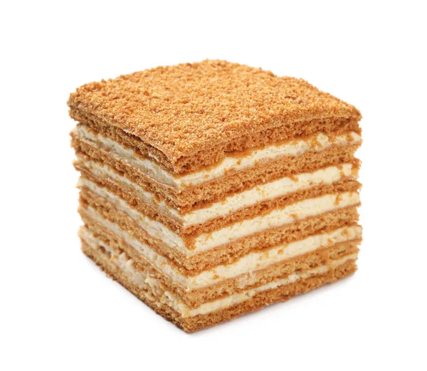 Beyaz üzerine izole edilmiş lezzetli katmanlı ballı kek.