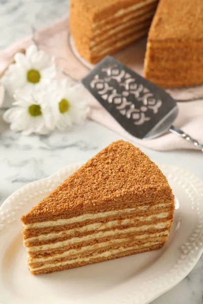 Slice Delicious Layered Honey Cake Served White Marble Table Closeup — Foto de Stock