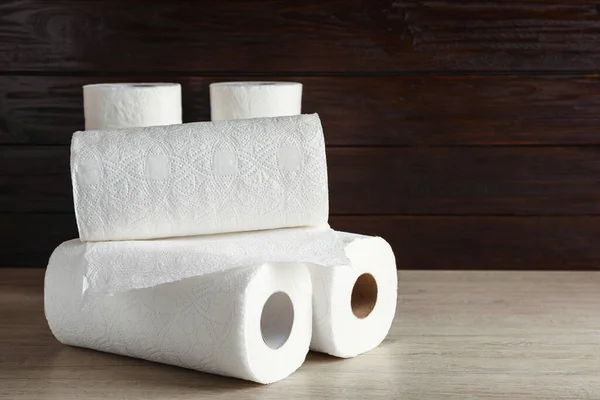 Many Rolls White Paper Towels Wooden Table Space Text — Stock Photo, Image