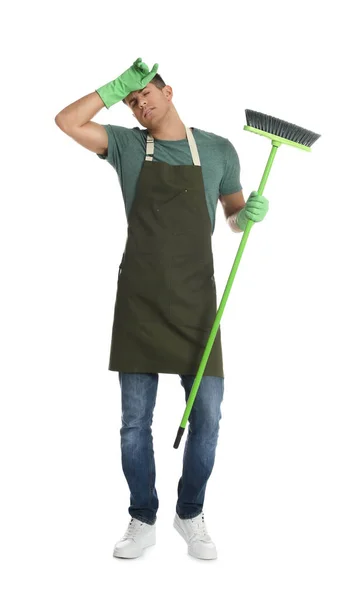 Tired Man Green Broom White Background — Fotografia de Stock
