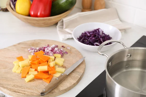 Board Cut Vegetables Knife White Countertop Kitchen —  Fotos de Stock
