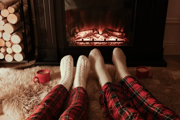 Couple Knitted Socks Fireplace Home Closeup Legs — Stock Photo, Image