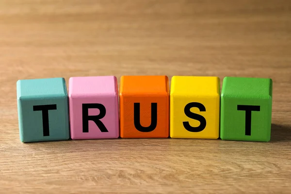 Colorful Cubes Word Trust Wooden Table —  Fotos de Stock