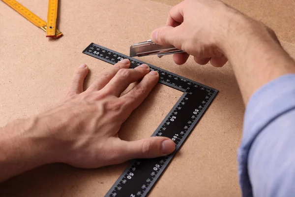 Man Cutting Chip Board Utility Knife Ruler Closeup — Stock Photo, Image