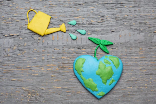 Boldog Föld Napját Lapos Feküdt Összetétele Műanyag Bolygó Öntözőkanna Szürke — Stock Fotó