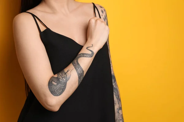 Beautiful Woman Tattoos Arms Yellow Background Closeup Space Text — Stock Photo, Image