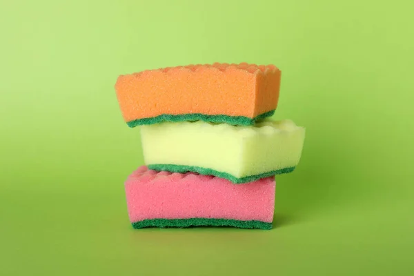 Three Stacked Cleaning Sponges Green Background — Stock Photo, Image
