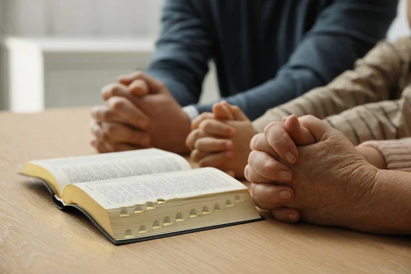 Boy His Godparents Praying Together Wooden Table Indoors Closeup — Foto de Stock