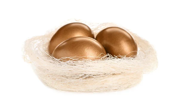 Beyaz Arka Planda Yuvada Bir Sürü Altın Yumurta — Stok fotoğraf