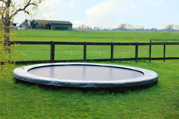 Spacious Backyard Trampoline Wooden Fence Early Morning — Stockfoto