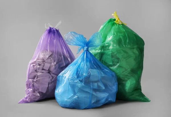 Trash Bags Full Garbage Grey Background — Fotografia de Stock
