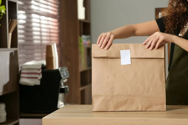 Worker Paper Bag Counter Cafe Closeup Space Text — Fotografia de Stock