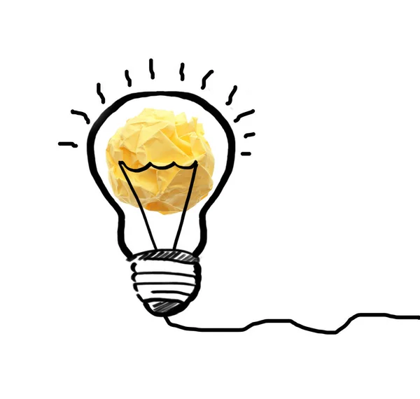 黄色の紙玉と白地に電球を描いた — ストック写真