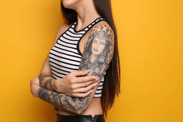 Beautiful Woman Tattoos Arms Yellow Background Closeup — Stock Photo, Image