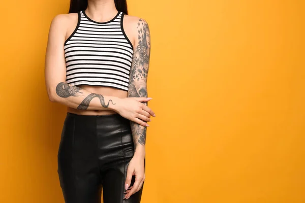 Beautiful Woman Tattoos Arms Yellow Background Closeup Space Text — Stock Photo, Image