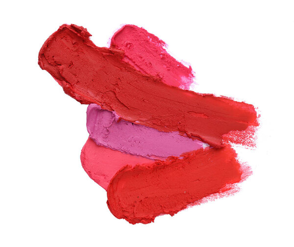 Коллекция разноцветных мазок помады на белом фоне