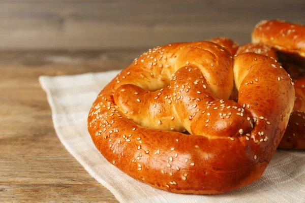 Tasty Freshly Baked Pretzels Wooden Table Closeup View — Stock Photo, Image