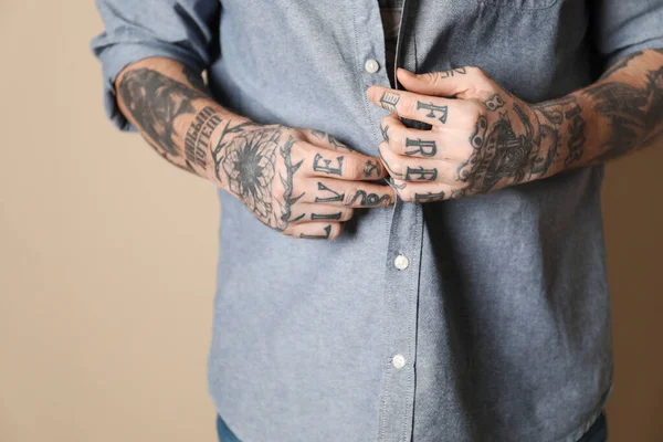 Young Man Tattoos Body Beige Background Closeup — Stock Photo, Image